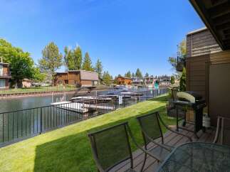 Enjoy waterfront living with your own private dock and boat slip, perfect for water enthusiasts.