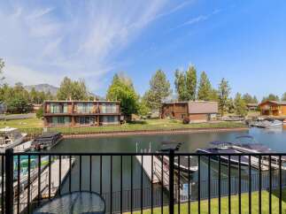 Enjoy waterfront living with this stunning property featuring private boat docks and direct access to the water.
