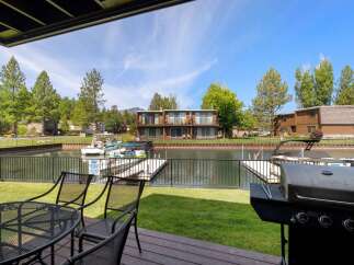 Enjoy waterfront living with this stunning property featuring a private dock perfect for your boat.