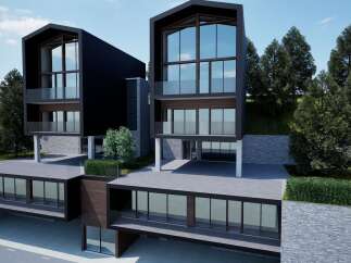 Experience modern luxury in this stunning architectural masterpiece, featuring expansive glass walls and sleek, dark exteriors.