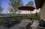 Enjoy breathtaking mountain views from this stunning deck, perfect for relaxing or entertaining.
