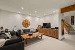 Discover this inviting basement living area, perfect for relaxation and entertainment.