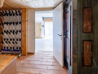 Discover this charming property featuring a dedicated ski/snowboard storage rack, perfect for winter enthusiasts.