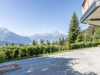 Experience breathtaking mountain views from this stunning property, featuring a spacious patio perfect for outdoor entertaining.