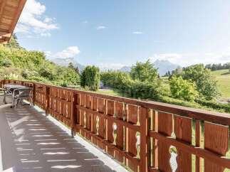 Enjoy breathtaking mountain views from this charming balcony, perfect for morning coffee or evening relaxation.