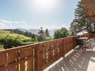Enjoy breathtaking mountain views from this charming balcony, perfect for morning coffee or evening relaxation.