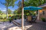 Enjoy outdoor living on this spacious deck, perfect for entertaining or relaxing.