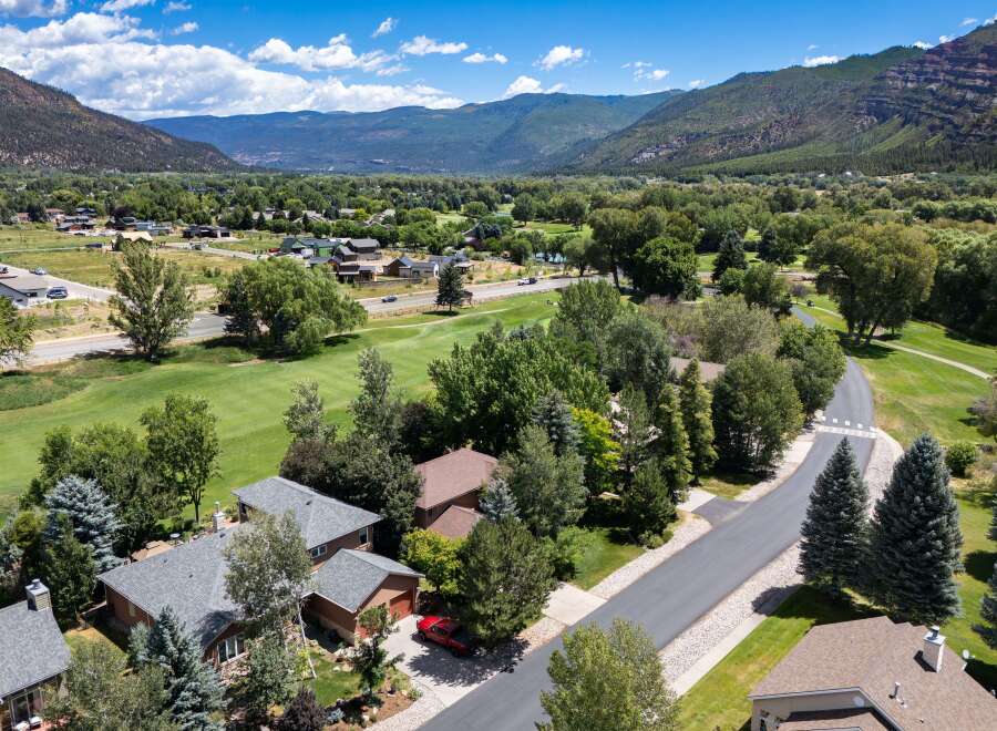 Nestled amidst a picturesque golf course and surrounded by majestic mountains, this property offers a serene and luxurious lifestyle.