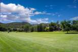 Experience luxury living with this stunning golf course view property, nestled against a backdrop of majestic mountains.