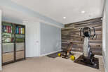 Transform your home into a personal fitness sanctuary with this dedicated workout space.