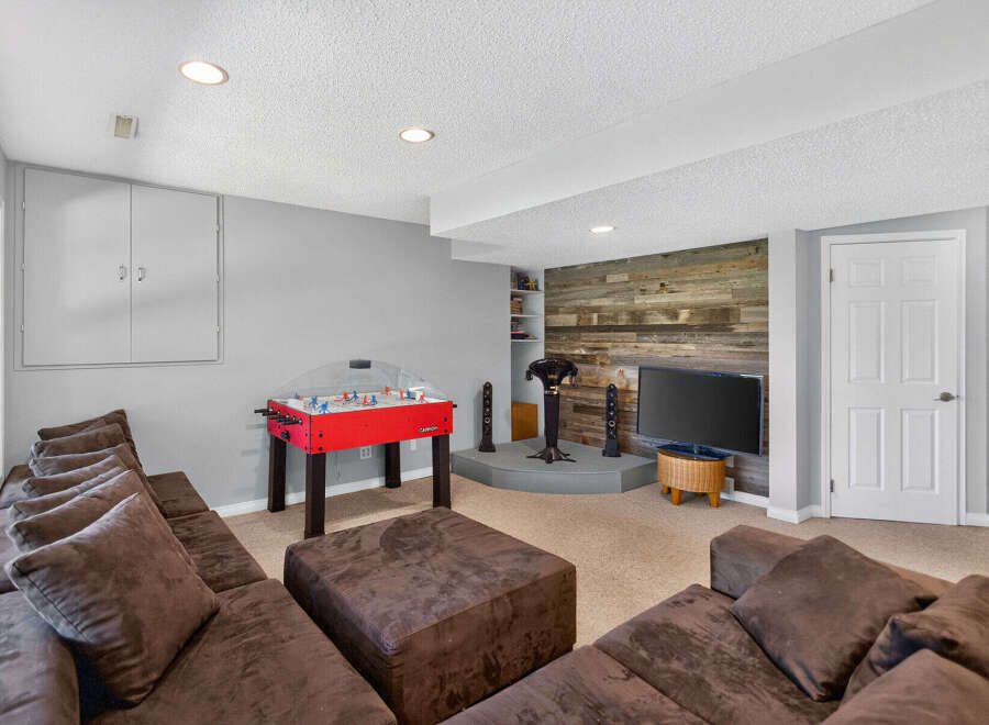 Step into this inviting finished basement, perfect for entertainment and relaxation.