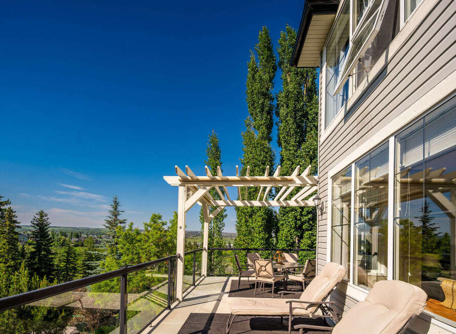 Enjoy breathtaking views from this expansive deck, perfect for entertaining or relaxing.
