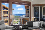 Experience breathtaking mountain views from this stunning property, featuring expansive windows that flood the living space with natural light.