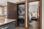 Discover modern convenience with this stacked LG washer and dryer set, perfect for maximizing space in your home.