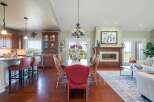 Experience open-concept living in this beautifully appointed home, featuring a gourmet kitchen with a breakfast bar and a spacious dining area perfect for entertaining.