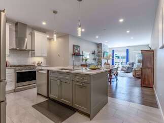 Experience modern living in this stunning open-concept kitchen and living area.