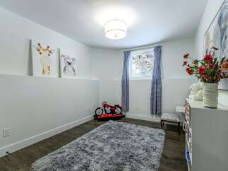 This charming room features playful decor, perfect for a child's space.