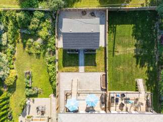 Discover this stunning backyard oasis, perfect for entertaining and relaxation.