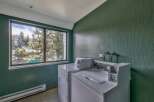 Enjoy the convenience of in-unit laundry with this spacious apartment, featuring two large washers and dryers.