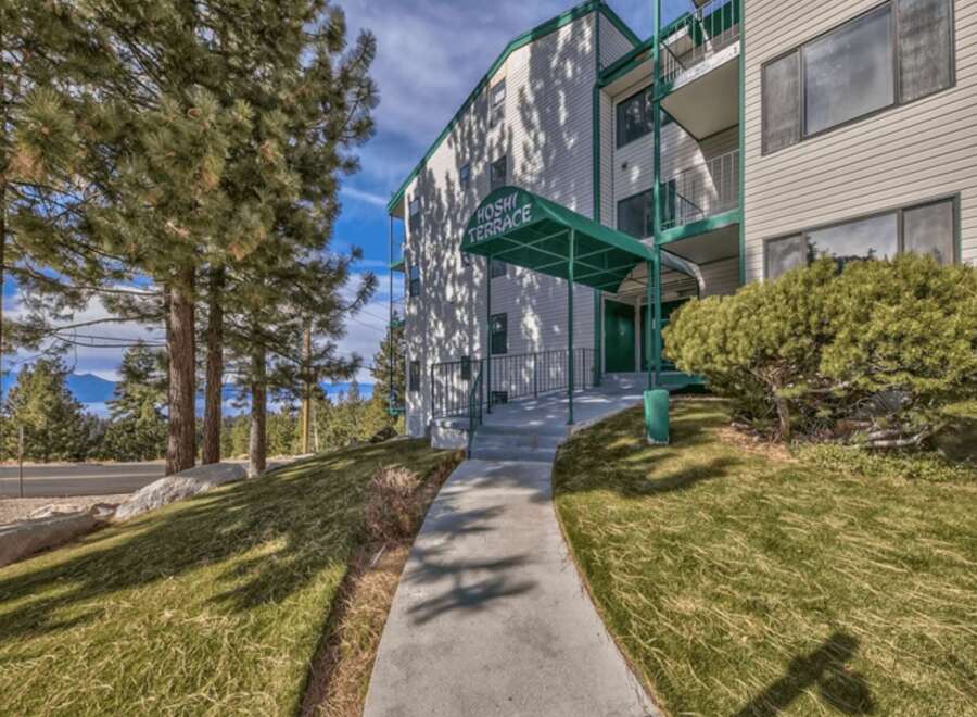 Discover comfortable living at Hoshi Terrace, a charming apartment building nestled amidst scenic mountain views.