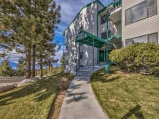 Discover comfortable living at Hoshi Terrace, a charming apartment building nestled amidst scenic mountain views.