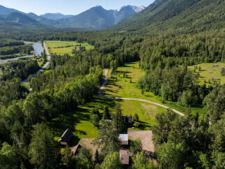Discover your private mountain retreat nestled amidst lush forests and rolling hills.