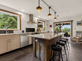 Experience the perfect blend of rustic charm and modern convenience in this stunning kitchen.