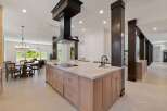 Experience luxury living in this expansive open-concept kitchen and dining area, perfect for entertaining.