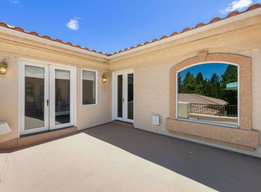 Enjoy the outdoors from this spacious patio, perfect for entertaining or relaxing.