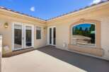 Enjoy the outdoors from this spacious patio, perfect for entertaining or relaxing.