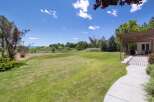 Enjoy the expansive green lawn perfect for outdoor activities and relaxation, complemented by a shaded pergola area ideal for al fresco dining.
