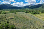 Discover this stunning property nestled amidst breathtaking mountain scenery.