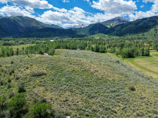 Discover this stunning property nestled amidst breathtaking mountain scenery.