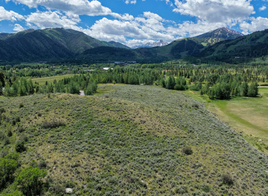 Discover breathtaking mountain views and serene natural beauty from this expansive property.