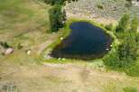 Discover this stunning property featuring a serene pond, perfect for tranquil moments and outdoor enjoyment.