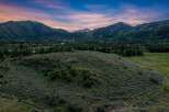 Experience breathtaking mountain views from this expansive property, perfect for building your dream home.