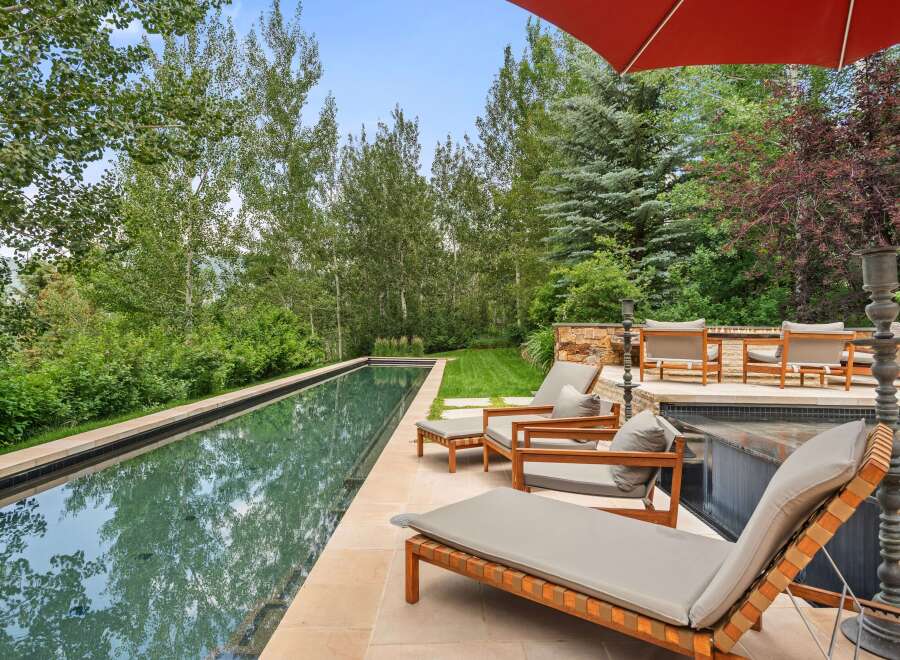 Experience luxurious outdoor living with this stunning infinity pool, perfect for a refreshing dip or lounging in the sun.