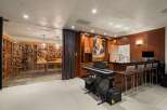 Experience luxury living with this stunning home featuring a climate-controlled wine cellar, perfect for the discerning collector.