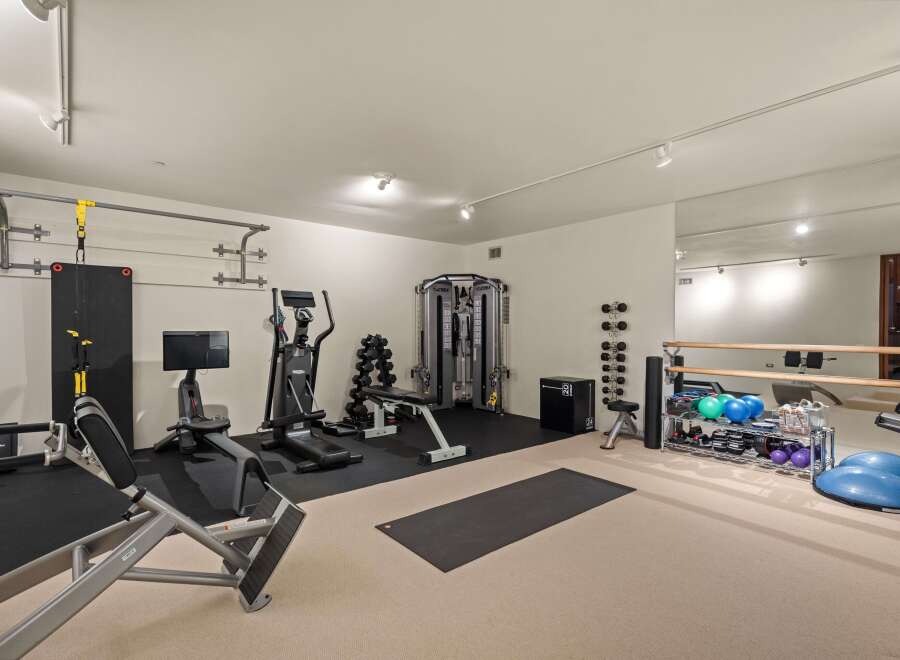 Transform your home into a personal fitness sanctuary with this fully equipped gym.