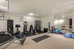 Transform your home into a personal fitness sanctuary with this fully equipped gym.