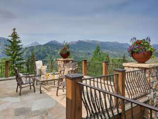 Experience breathtaking mountain views from this stunning patio, perfect for enjoying your morning coffee or evening cocktails.