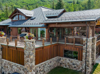 Experience luxury mountain living in this stunning custom-built home, nestled amidst lush greenery and breathtaking natural landscapes.
