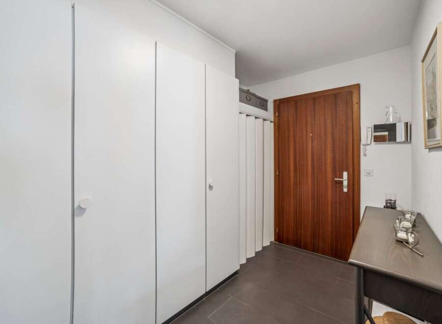 Step into this inviting entryway featuring a sleek, modern design.