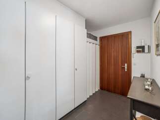 Step into this inviting entryway featuring a sleek, modern design.