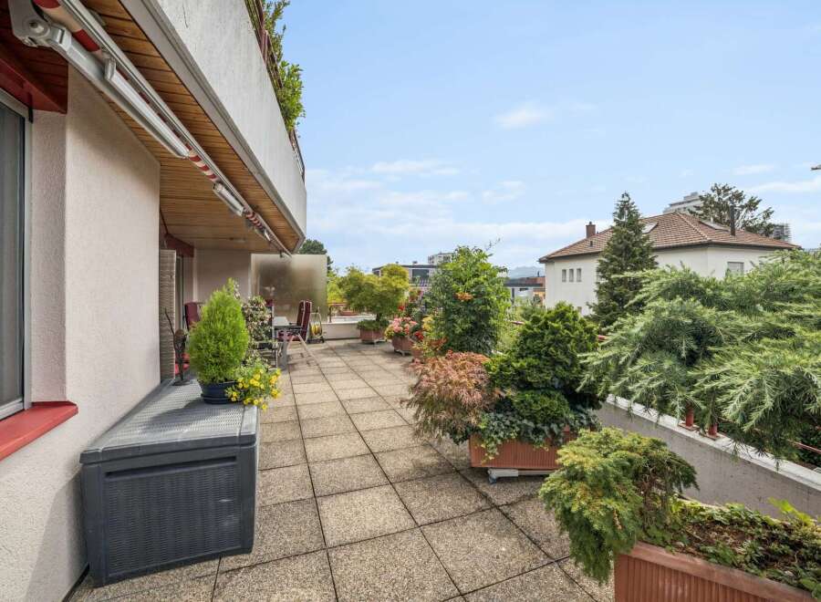 Enjoy outdoor living on this spacious balcony, perfect for relaxing and entertaining.