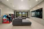 Step into this ultimate entertainment room, perfect for family fun and gaming nights.