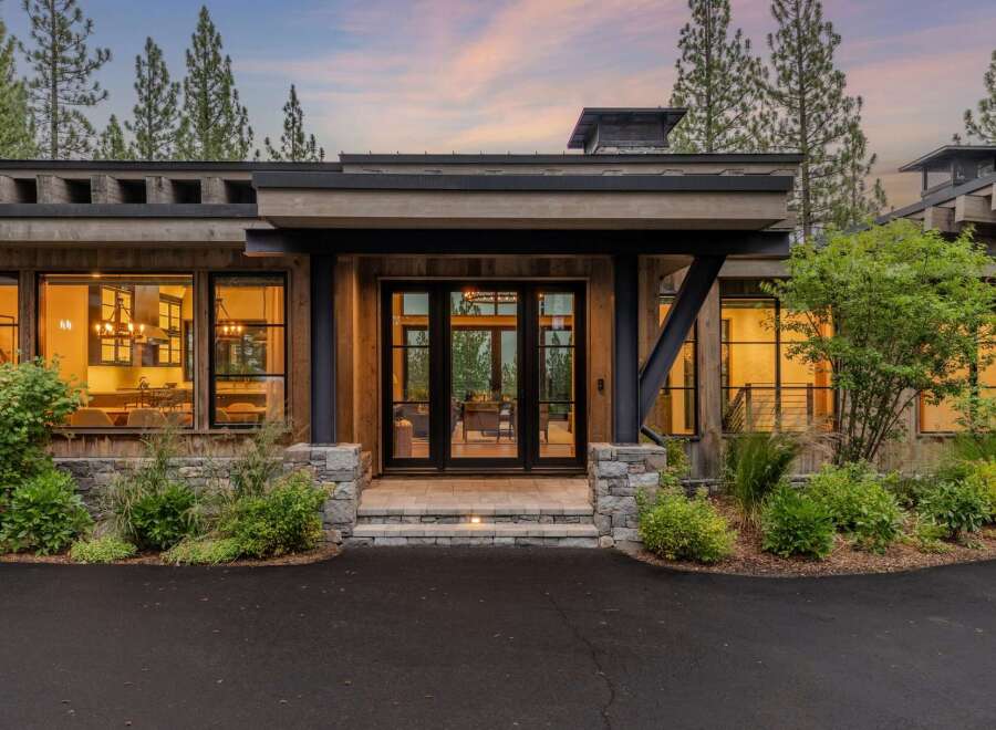 Experience luxury mountain living in this stunning modern lodge-style home.
