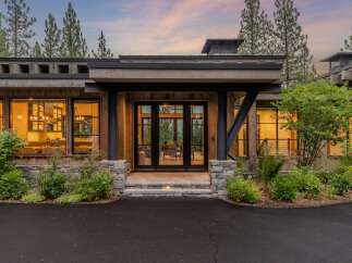 Experience luxury mountain living in this stunning modern lodge-style home.