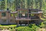 Experience luxury mountain living in this stunning modern home, nestled amongst towering pine trees.
