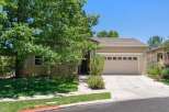 Discover this charming single-family home featuring a spacious two-car garage and a welcoming front entrance.